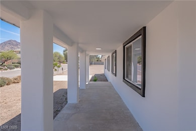 View of patio with a mountain view