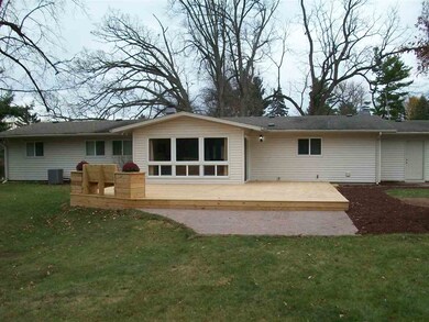 Large new deck with cozy bench!