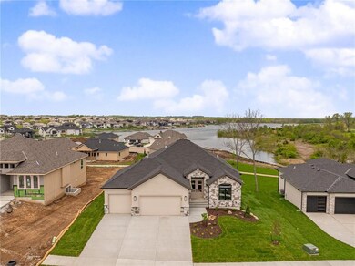 1404 Kintyre Ct, Raymore, MO 64083 - photo 5