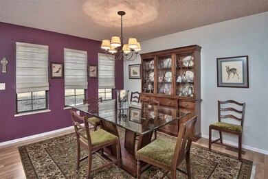 The formal dining area is just off the kitchen and