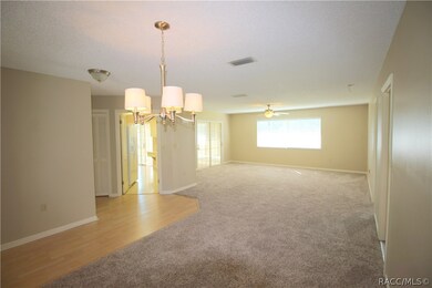 Living and Dining areas in Great Room