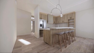 Kitchen featuring light countertops, a kitchen br