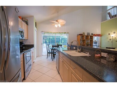 Open Kitchen w/ breakfast bar & eat in dining