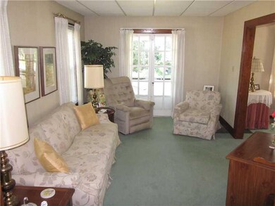 Living Room. with french doors that open to the po