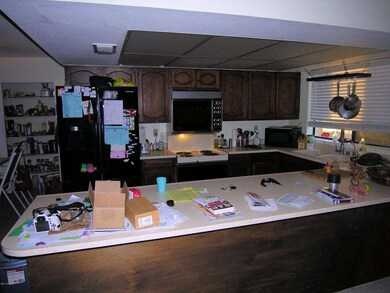 Kitchen, note part of pantry showing to
