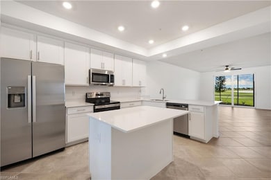 Kitchen featuring appliances with stainless steel 