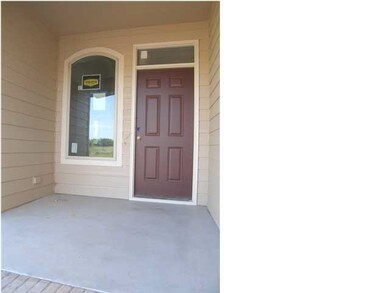 The sizable front porch welcomes and shelter guest