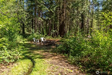You will find an established firepit streamside for spring and fall gatherings.