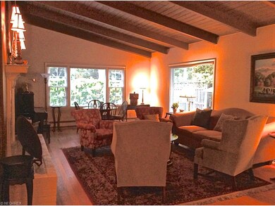 The vaulted wooden ceiling and gorgeous hardwood f