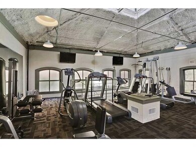 Photo. Workout room overlooking pool. Clubhouse sp