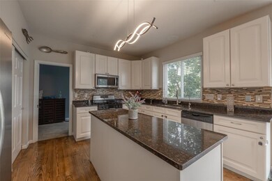 Lovely white kitchen with center island