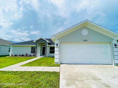 1271 Rabbit St SE, Palm Bay, FL 32909 - photo 5