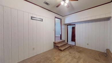 (former garage) door on left accesses living room,