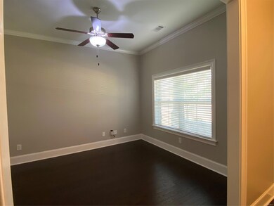 The formal dining room can easily be used as a liv