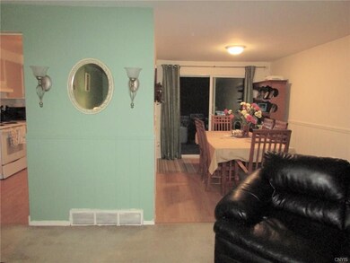 Living room flows nicely into dining room with sli