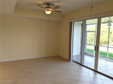 Unfurnished room with light tile patterned floorin