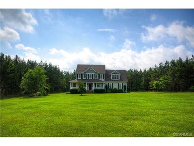 House is nestled in the center of 2 private acres.