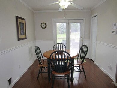 This view of the Dining Area shows the chair rail,