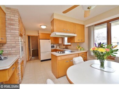 The character continues into the bright kitchen wi