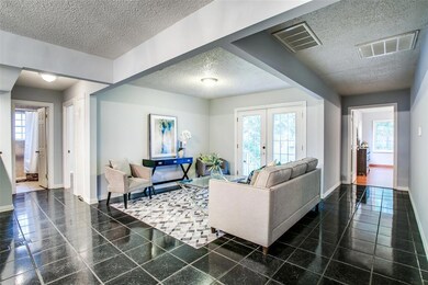 View of living room from dining area.