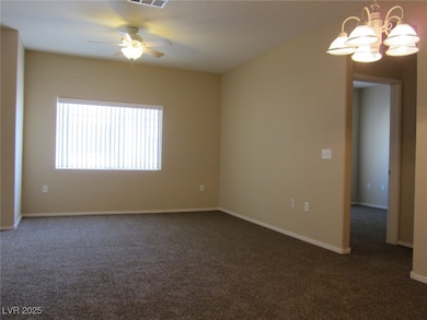 Unfurnished room with baseboards, carpet flooring,