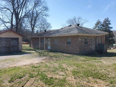 Plenty of parking, plus a large storage shed.