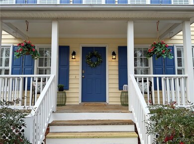 Doorway to property featuring a porch