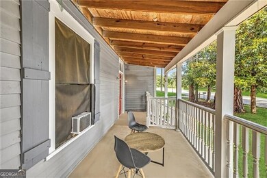 Porch featuring cooling unit
