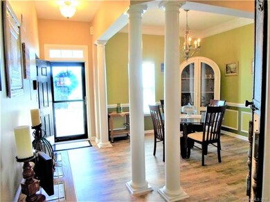 Formal dining room and entry hall.