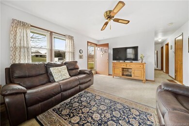 LIVING ROOM HAS PLENTY OF ROOM FOR FURNITURE PLACE