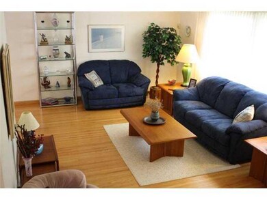 Living Room. Spacious living room with hardwood fl
