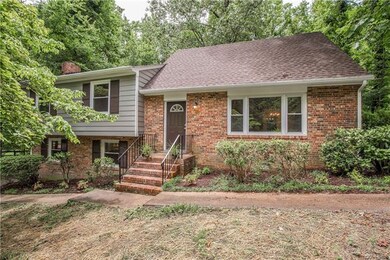 NEW roof/gutters, windows and exterior doors!