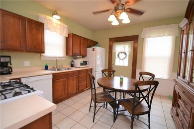 HARDWOOD CABINETS, CERAMIC TILE FLOOR, NEW WHITE A