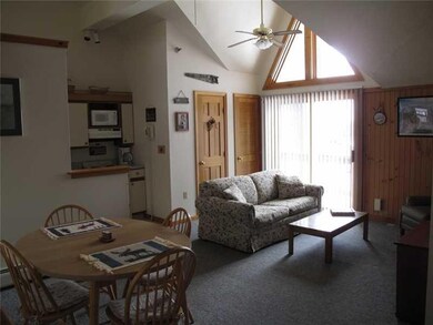 Living Room. Door on right houses...