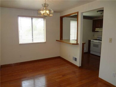 Dining Room. Gleaming Hardwood Floors and a Counte