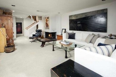 Living area with corner fireplace