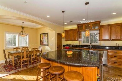 Another view of the kitchen and dining area