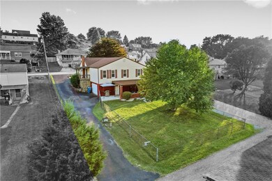 Highlighted Aerial View of Backyard with Large Dri
