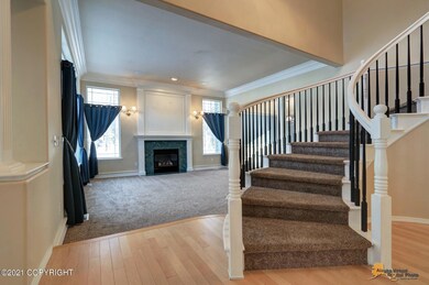 Living Room w/Winding Staircase