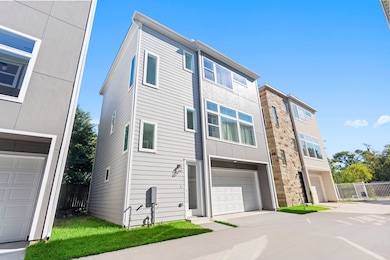 Sleek front elevation showcasing contemporary design and a spacious 2-car garage.