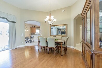 Large dining area with a neutral color pallet and 