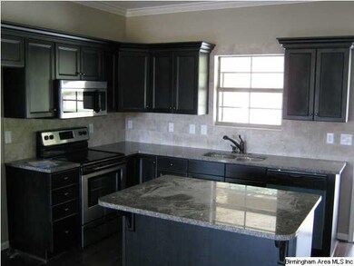 ISLAND WITH EATING AREA-GRANITE COUNTER TOPS-TILE 