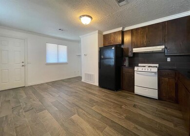 Kitchen with visible vents, under cabinet range ho