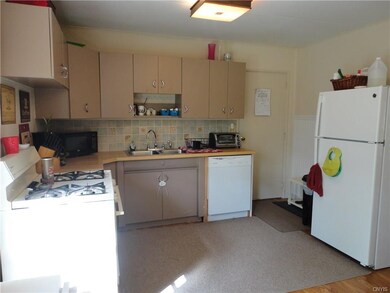 Ample kitchen with new fridge ,new flooring & fres