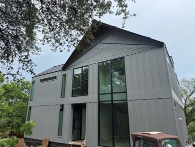 View of home's exterior with board and batten sid