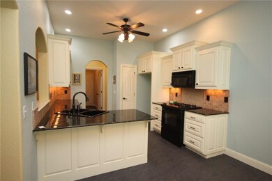 view from dining area in kitchen