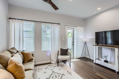 The family room features rich luxury vinyl floorin