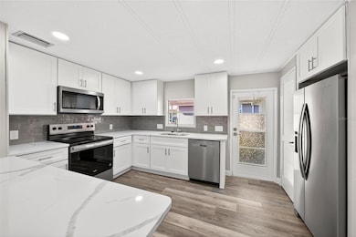 1114 Elkhart Cir, Tavares, FL 32778 - photo 4