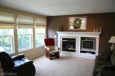 8299 Hawkshead SE unit 63, Byron Center, MI 49315 - photo 3