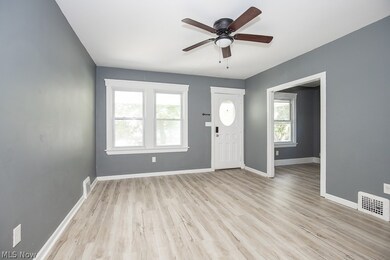 Entryway featuring ceiling fan and light hardwood / wood-style flooring